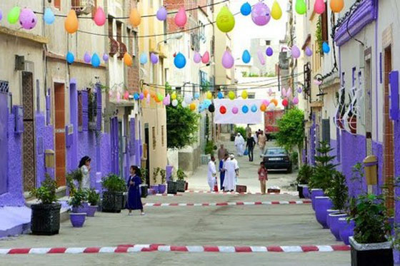 شباب طنجة المغربية يحولون شوارعهم الى تحف فنية مزينة بالورود والأشجار والالوان صورة رقم 3 شباب طنجة المغربية يحولون شوارعهم الى تحف فنية مزينة بالورود والأشجار والالوان صورة رقم 3