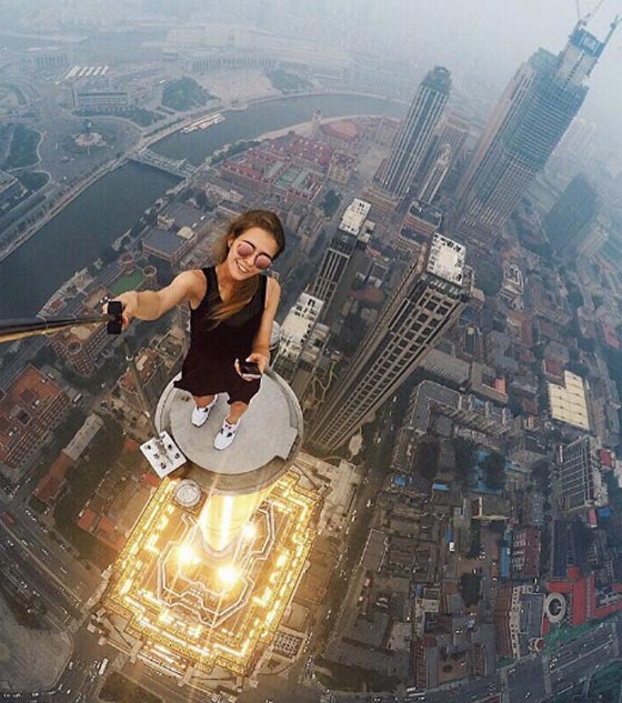 لن تصدق كيف تلتقط هذه الفتاة الروسية صور سيلفي خطيرة! صورة رقم 10