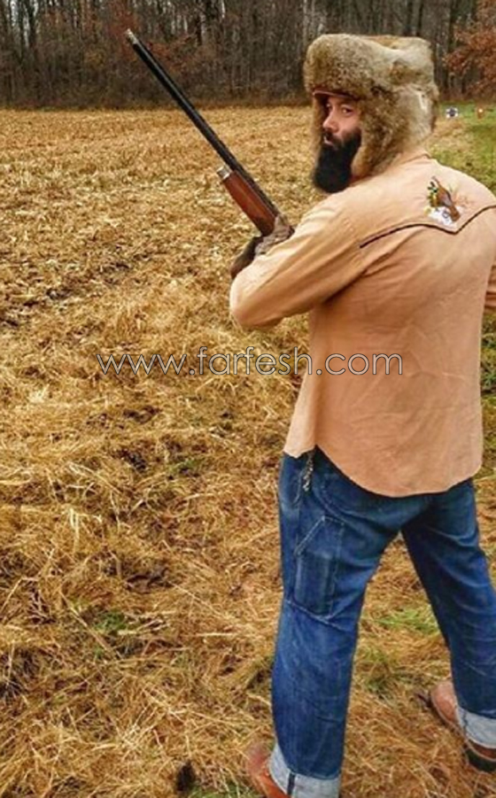 رجل يعزف الحانا تبعث على الفرح من بندقية كلاشينكوف.. فيديو صورة رقم 12 رجل يعزف الحانا تبعث على الفرح من بندقية كلاشينكوف.. فيديو صورة رقم 12