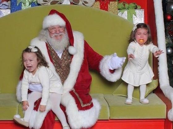 صور طريفة.. لحظات رعب تنتاب الاطفال في اول لقاء مع بابا نويل! صورة رقم 3