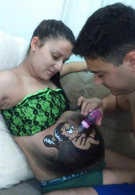 شاب يحول بطن زوجته الحامل الى لوح لرسوماته المدهشة! صور صورة رقم 3