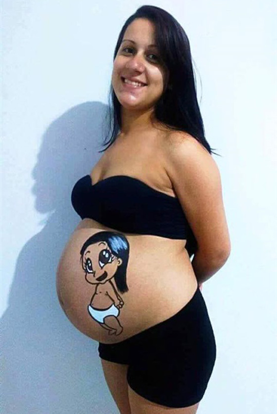 شاب يحول بطن زوجته الحامل الى لوح لرسوماته المدهشة! صور صورة رقم 9