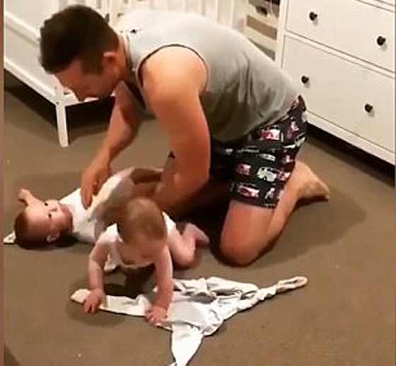 فيديو طريف.. معاناة أب يعد ابنتيه التوأم للنوم صورة رقم 1