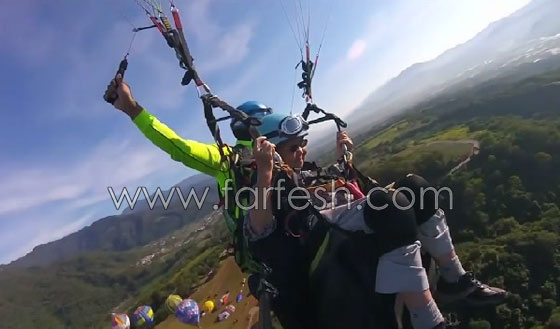 عجوز تايوانية (93 عاما) تقوم بمغامرة جنونية بجولة طيران مظلي صورة رقم 4