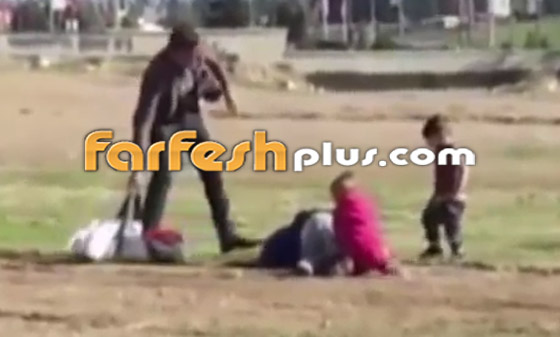 فيديو صادم لرجل يعتدي على زوجته بالضرب المبرح أمام أطفالهما بالشارع! صورة رقم 7 فيديو صادم لرجل يعتدي على زوجته بالضرب المبرح أمام أطفالهما بالشارع! صورة رقم 7
