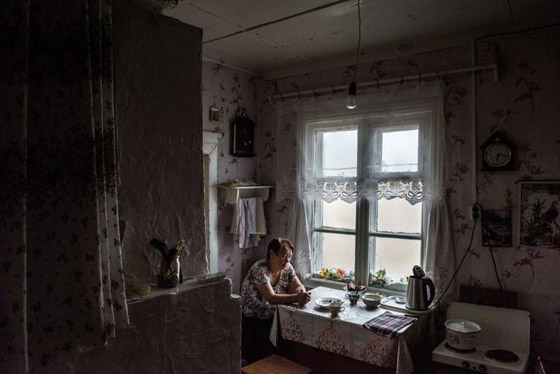 صور قرية روسية غارقة بالرمال وسكانها يدخلون بيوتهم من الأسطح صورة رقم 8