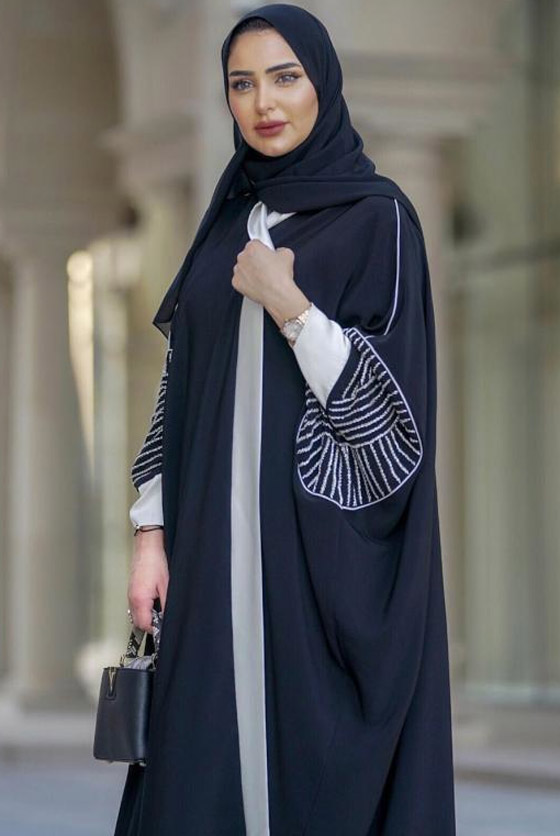 بالصور: أجمل العبايات السوداء موضة الموسم من الفاشينيستا المحجبات صورة رقم 10 بالصور: أجمل العبايات السوداء موضة الموسم من الفاشينيستا المحجبات صورة رقم 10