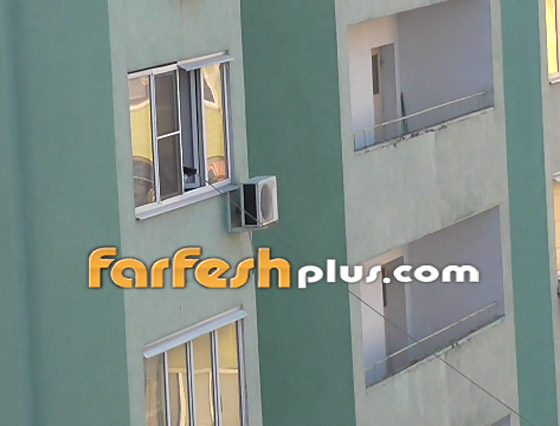 بالفيديو.. أم عبقرية وكسولة تلاعب ابنها في الشارع من الطابق الرابع! صورة رقم 1