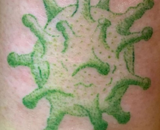 جديد العالم.. صور كورونا وشوماً على الأجساد صورة رقم 1