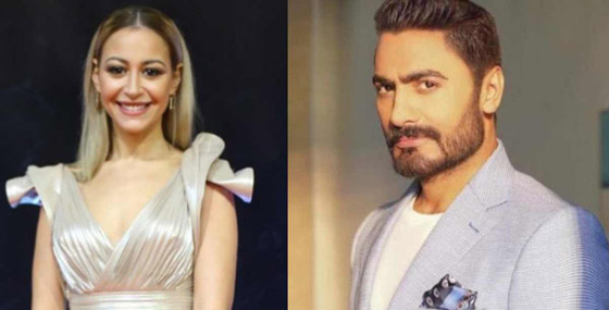 تامر حسني يغني لـ منة شلبي بعد 10 سنوات.. والجمهور يلاحظ شيء غريب بينهما! صورة رقم 9