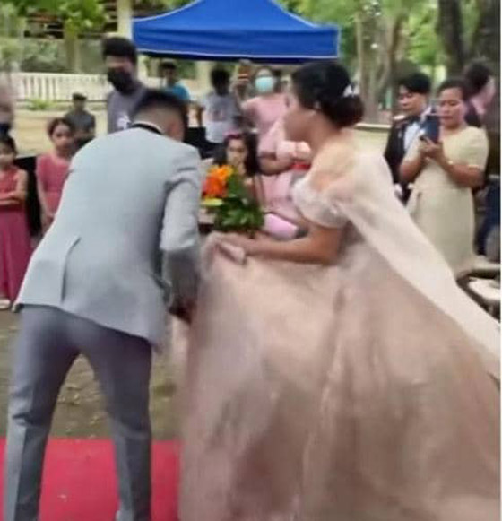 رجل تحت الفستان.. فيديو لعروس في موقف محرج يوم زفافها صورة رقم 1