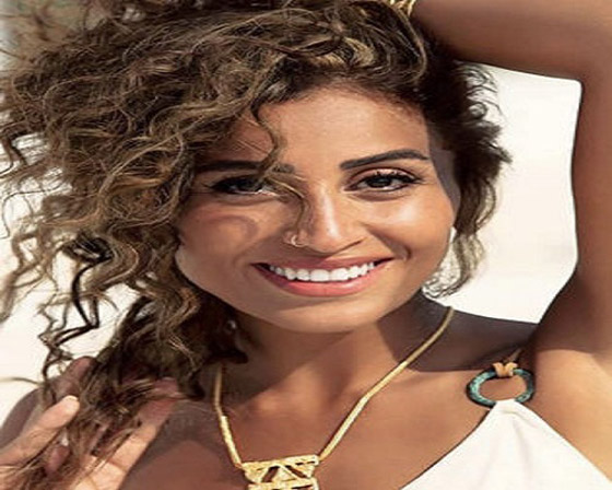 صور: دينا الشربيني وشبيهتها عارضة الازياء العالمية (من اصل مصري/ مغربي) ايمان همام.. هل الشبه كبير؟ صورة رقم 3