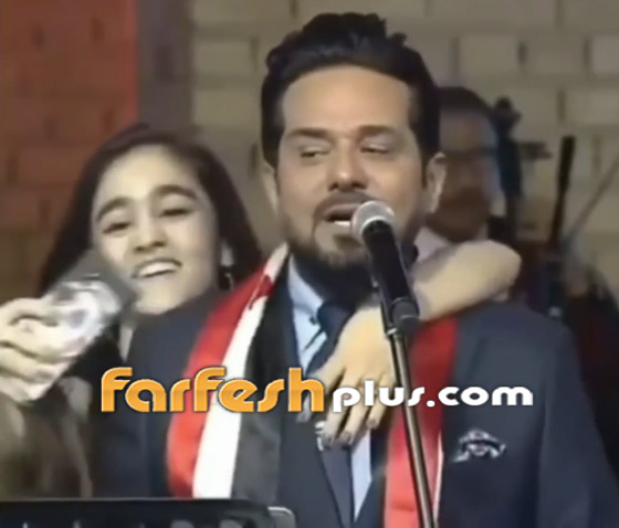 فيديو: فتاة تقتحم المسرح في حفل حاتم العراقي.. وهذه ردة فعله صورة رقم 6 فيديو: فتاة تقتحم المسرح في حفل حاتم العراقي.. وهذه ردة فعله صورة رقم 6