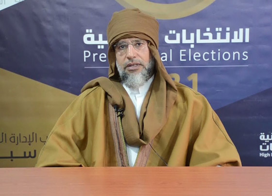القذافي الابن عاد بالرداء الليبي وبنفس اللون الذي اشتهر به والده صورة رقم 1 القذافي الابن عاد بالرداء الليبي وبنفس اللون الذي اشتهر به والده صورة رقم 1