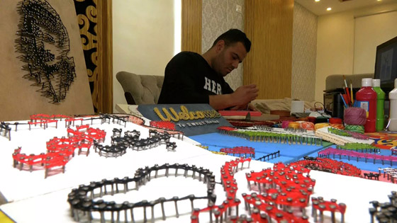 بالفيديو: فلسطيني يشكل لوحات فنية رائعة بالمسمار والخيط صورة رقم 3