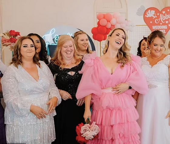 حفل زفاف جماعي مدهش لـ 25 عريساً وعروساً في أستراليا صورة رقم 2