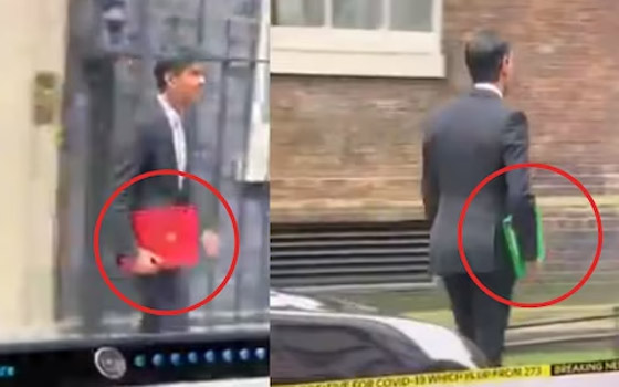 فيديو: تغير لون الملف بيد رئيس وزراء بريطانيا من أحمر لأخضر بثانية! صورة رقم 3 فيديو: تغير لون الملف بيد رئيس وزراء بريطانيا من أحمر لأخضر بثانية! صورة رقم 3