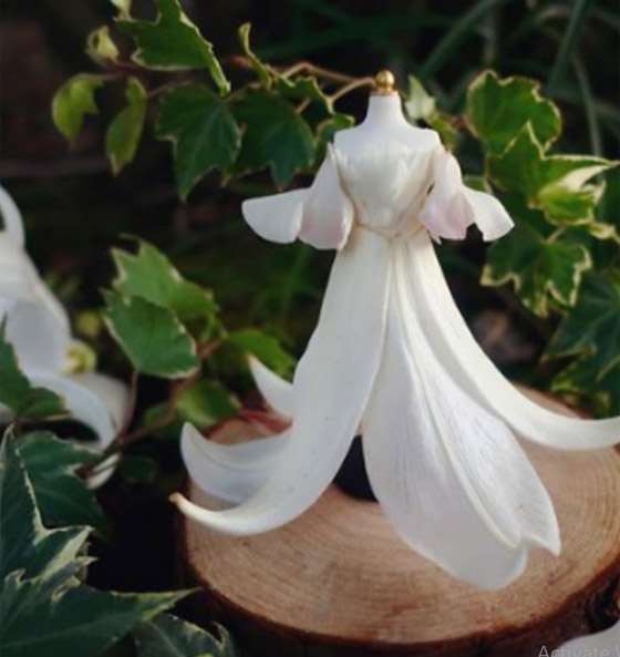 بالصور... فنانة تصنع فساتين مدهشة من الزهور صورة رقم 4