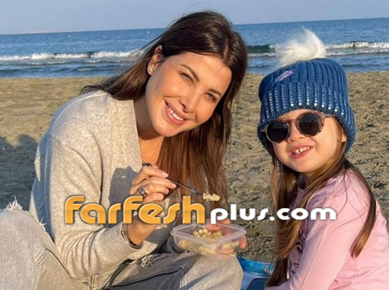 فيديو مؤثر: نانسي عجرم أم قبل أن تكون فنانة: تحمل ابنتها النائمة على كتفها في المطار صورة رقم 6 فيديو مؤثر: نانسي عجرم أم قبل أن تكون فنانة: تحمل ابنتها النائمة على كتفها في المطار صورة رقم 6
