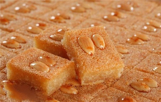 طريقة عمل.. صينية البسبوسة باللوز والسكر صورة رقم 1