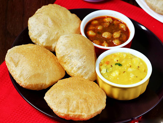 إليكم طريقة تحضير خبز البوري المنفوخ المقلي بطعمه المميز والطيب صورة رقم 3