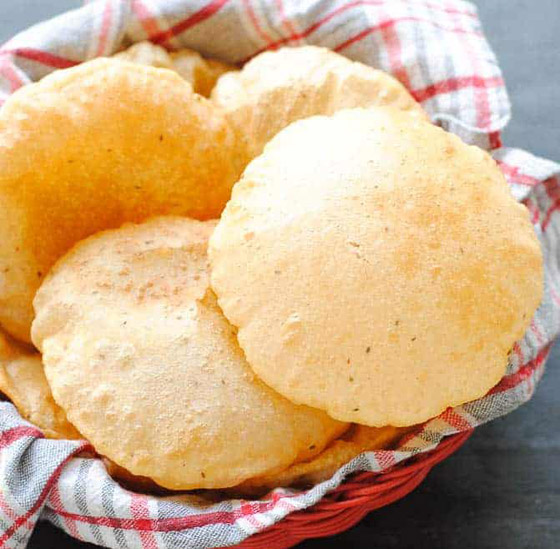 إليكم طريقة تحضير خبز البوري المنفوخ المقلي بطعمه المميز والطيب صورة رقم 8