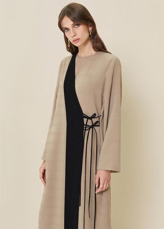 صور: العبايات الملتفة حول الجسم نجمة 2024.. صيحة تخفي البطن البارز صورة رقم 2