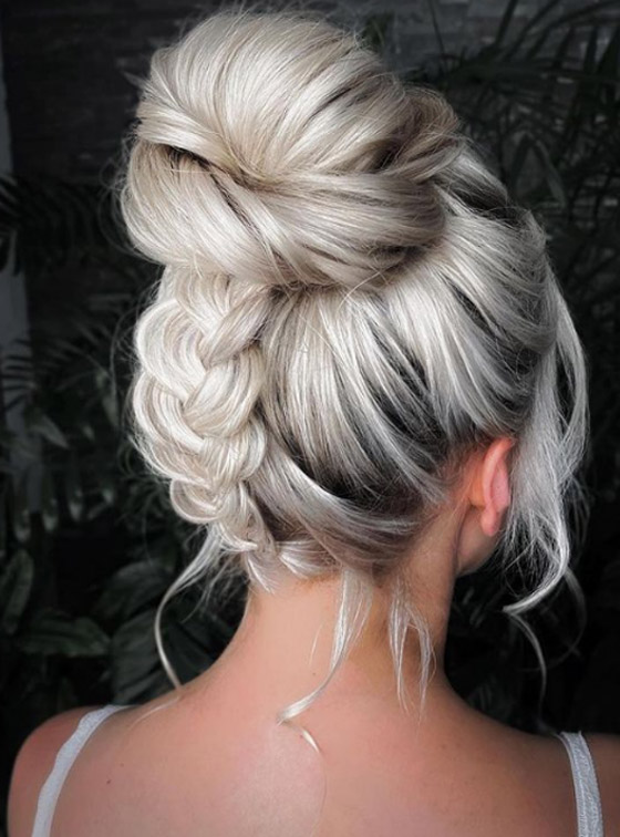 تسريحات شعر مرفوعة للوجه البيضاوي تبرز ملامح الوجه بشكل جذاب صورة رقم 4