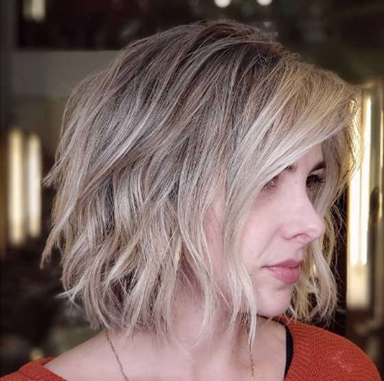 قصات شعر تعطي كثافة للشعر الخفيف.. لا تتردّدي في اعتمادها صورة رقم 3