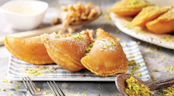 إليكم طريقة تحضير قطايف بالجوز والقرفة صورة رقم 8