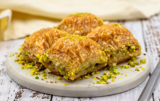 إليكم طريقة تحضير البقلاوة اليونانية الطيبة صورة رقم 4