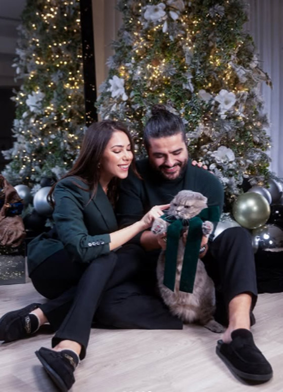 دانييلا رحمة وناصيف زيتون يحتفلان بأحد الشعانين مع طفلهما إلياس صورة رقم 7