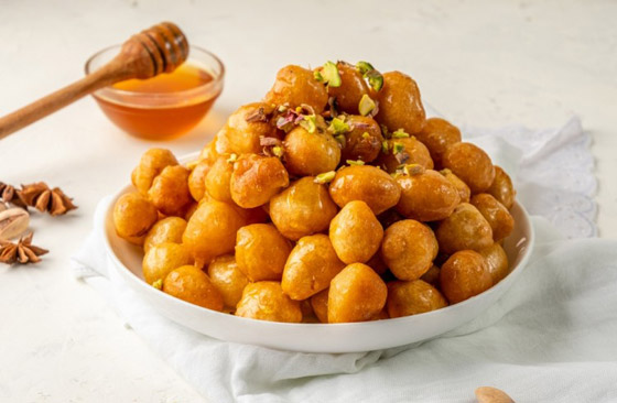 إليكم طريقة تحضير لقيمات رمضان الشهية صورة رقم 5