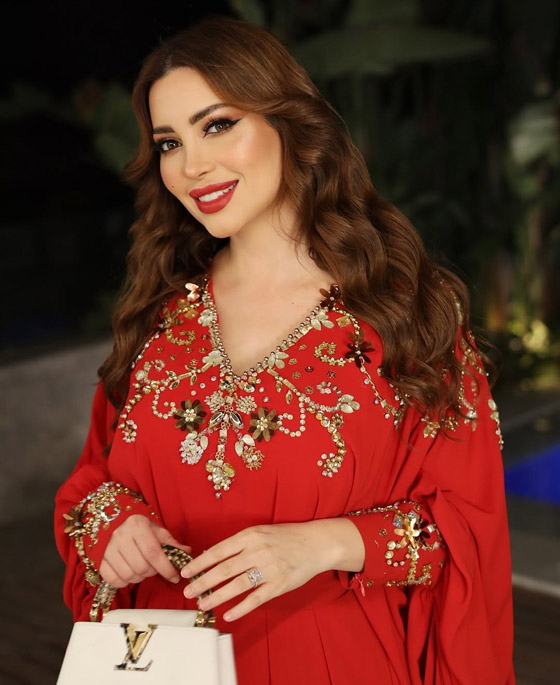 نسرين طافش في أحدث ظهور تتألق بالقفطان الأحمر بعد زواجها صورة رقم 7 نسرين طافش في أحدث ظهور تتألق بالقفطان الأحمر بعد زواجها صورة رقم 7