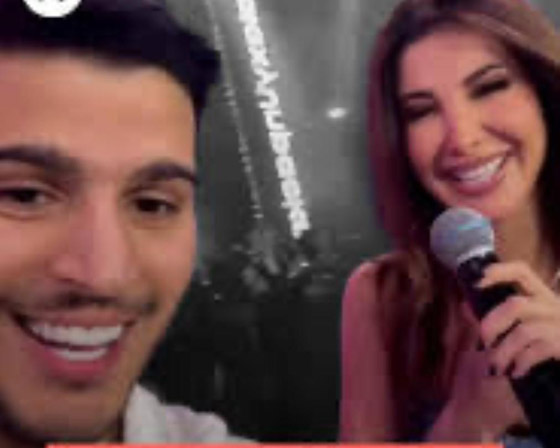 معجب يقتحم المسرح ويشارك نانسي عجرم غناء (حبّك سفّاح) ويرجوها: احكيلهم إنك بتحبيني صورة رقم 3