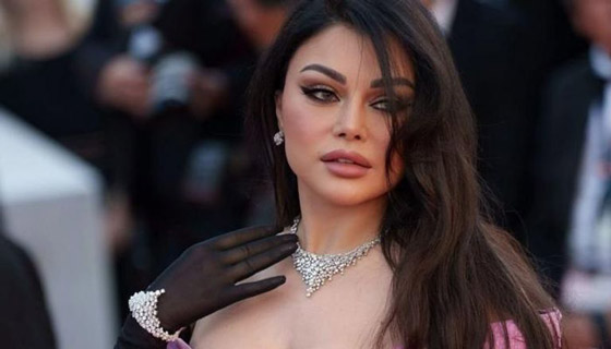 هيفاء وهبي تفاجئ الجمهور وتطلب من مصمم الأزياء ان يقصّ فستانها على المسرح صورة رقم 6 هيفاء وهبي تفاجئ الجمهور وتطلب من مصمم الأزياء ان يقصّ فستانها على المسرح صورة رقم 6