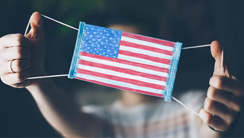 أمريكا تتخلى عن إلزامية ارتداء الكمامات للحاصلين على اللقاح