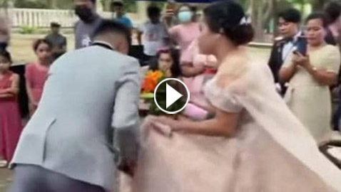 رجل تحت الفستان.. فيديو لعروس في موقف محرج يوم زفافها