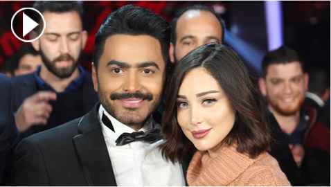 تامر حسني يحتفل مع زوجته بالساحل الشمالي.. والجمهور ينتقد حركات الأخيرة