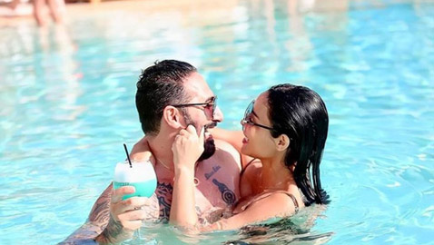 صور ابتسام بطمة شقيقة دنيا بطمة مع زوجها في حمام السباحة تثير الجدل! صور جريئة..