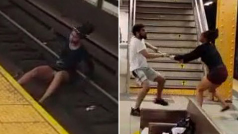 رجل يدفع سيدة لتسقط على قضبان قطار.. بصق عليها وكاد يقتلها!