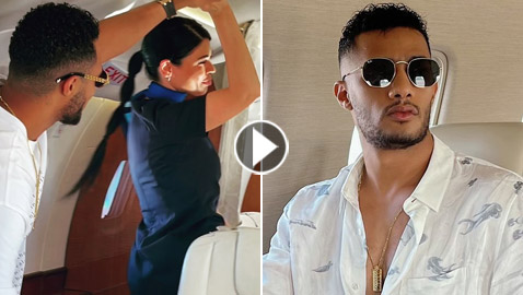 فيديو: محمد رمضان يرقص مع مضيفتي طيران داخل الطائرة.. ويعلق: المضيفة الفرفوشة