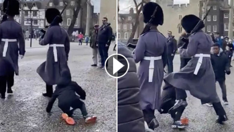 بالفيديو.. حارس لملكة بريطانيا يطرح ويبعد طفلا عن طريقه بقدميه!