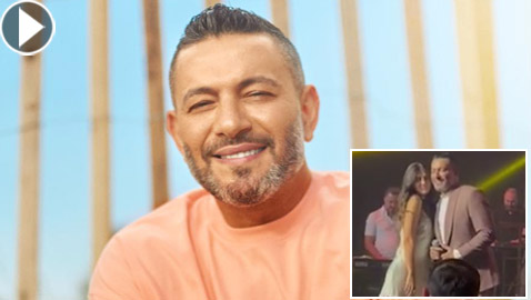 فيديو زياد برجي ينسى كلمات أغنيته على المسرح بعد أن فاجأته مُعجبة حسناء بقبلة على خده