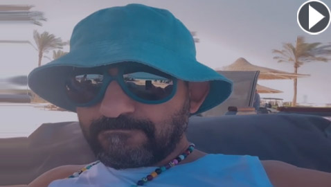 علامات السن تظهر بوضوح على أحمد حلمي أثناء قضائه الإجازة الصيفية.. والجمهور: كبرت كده امتى يا حلمي؟!