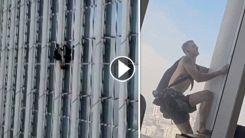 فيديو: شاب بريطاني يتسلق أعلى برج في العالم بيديه المجردتين!