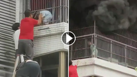 فيديو يخطف الأنفاس.. لحظة إنقاذ طفل حوصر بالنيران