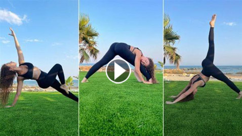 ميريام فارس بإطلالة جريئة ومثيرة للغرائز على الشاطئ تمارس اليوغا