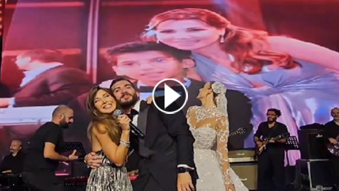 فيديو طريف: عريس يفاجئ نانسي عجرم بحفل زفافه بصورته معها وهو طفل!