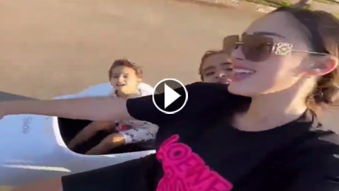 فيديو وصور بسمة بوسيل طليقة تامر حسني تقود الدراجة النارية مع أولادها